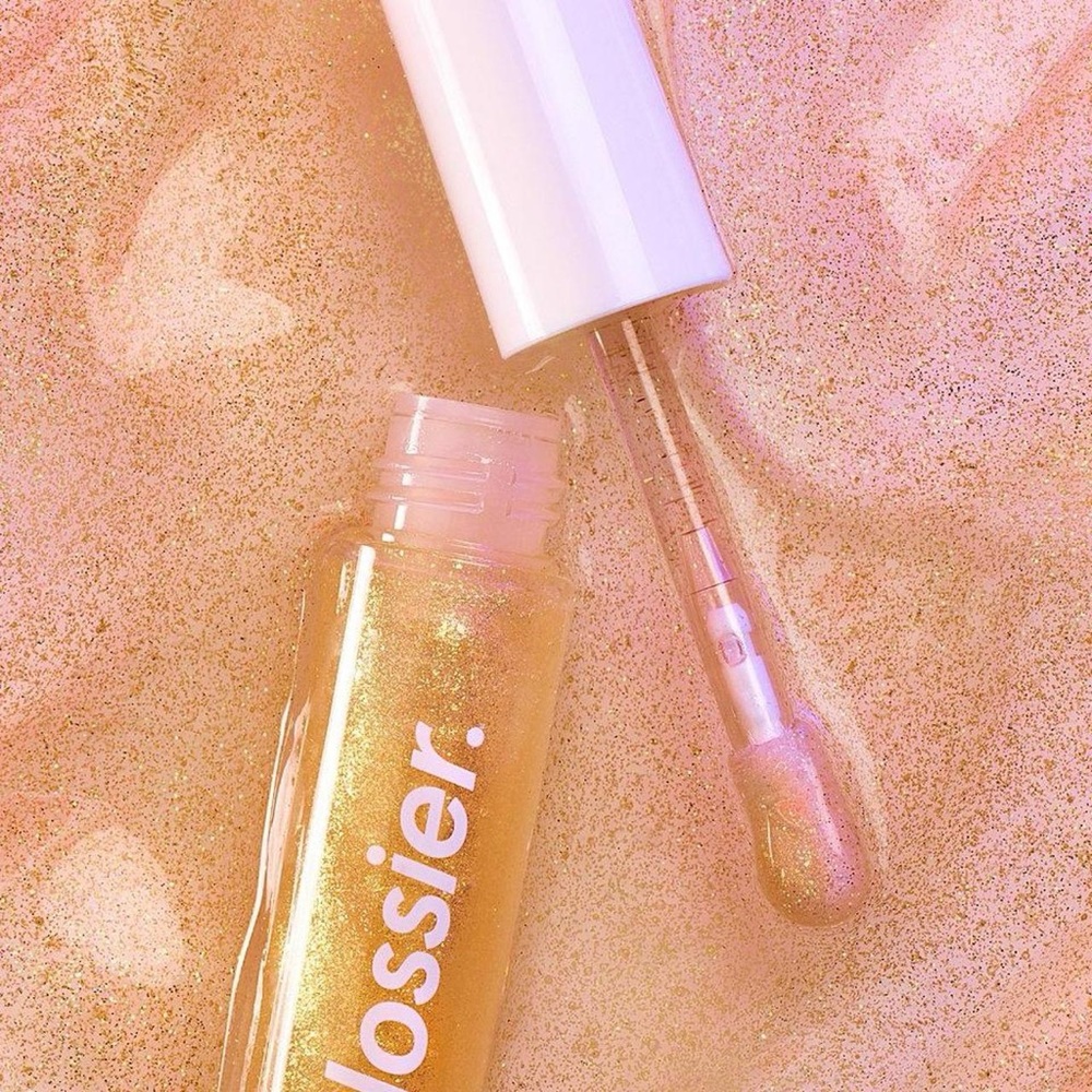 never opened limited edition glossier gold lip gloss